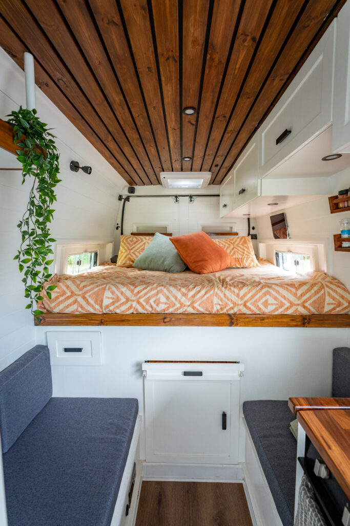 Fixed bed vs dinette van conversion layouts